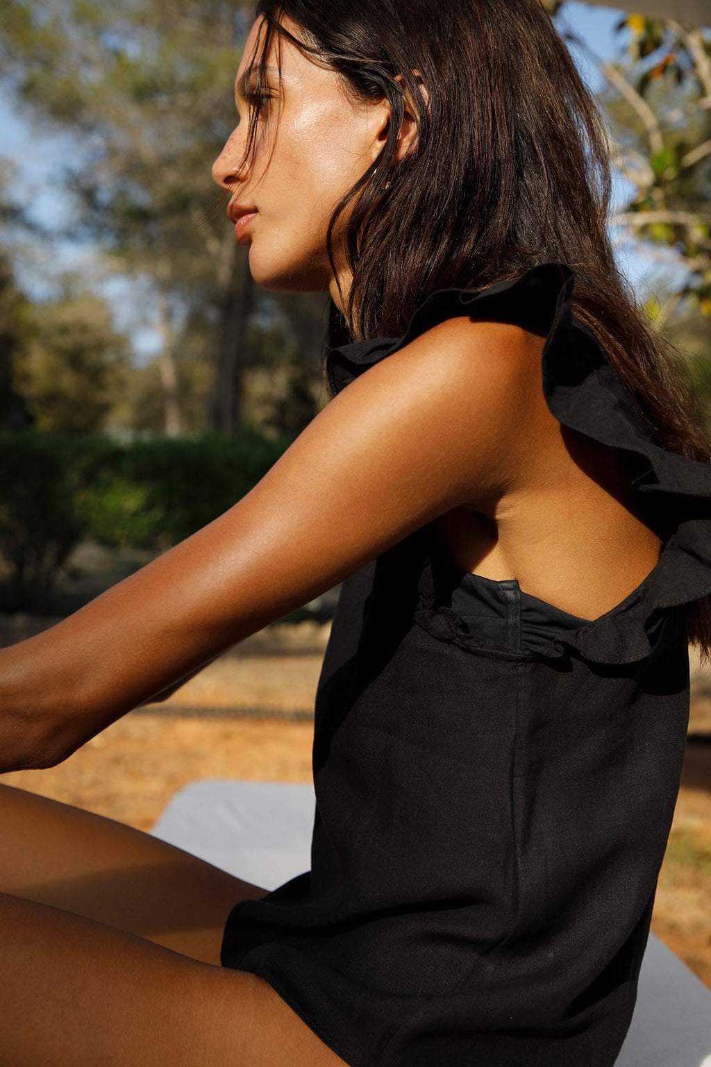 The Jeanne Ruffled Top in black