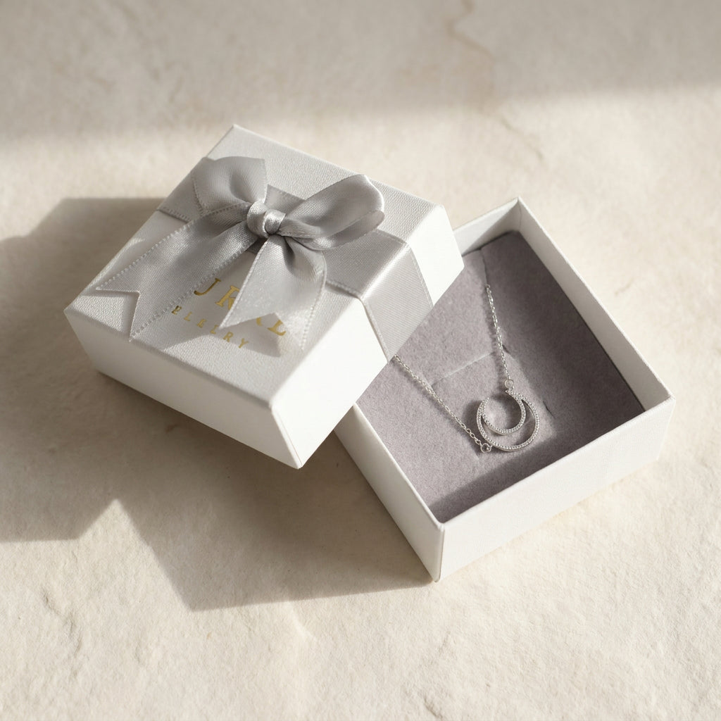 925 sterling silver crescent moon necklace presented in LAURRÈ branded box